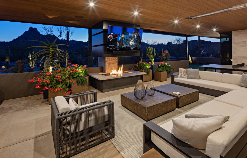 Photo of a contemporary backyard patio in Phoenix.