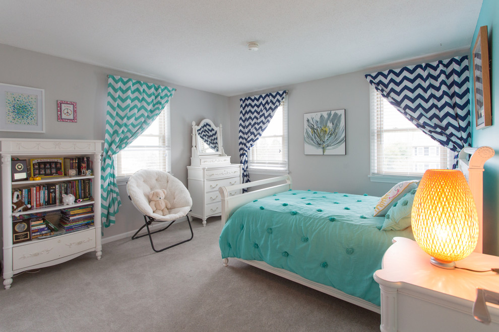 Inspiration for a mid-sized transitional kids' room for girls in Bridgeport with grey walls and carpet.