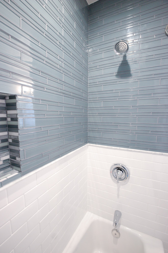 Photo of a small transitional bathroom in Orange County with an alcove tub, a shower/bathtub combo, blue tile and glass tile.