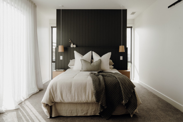 Minimalist Bedroom with Statement Wall and Warm Textures rustic-bedroom