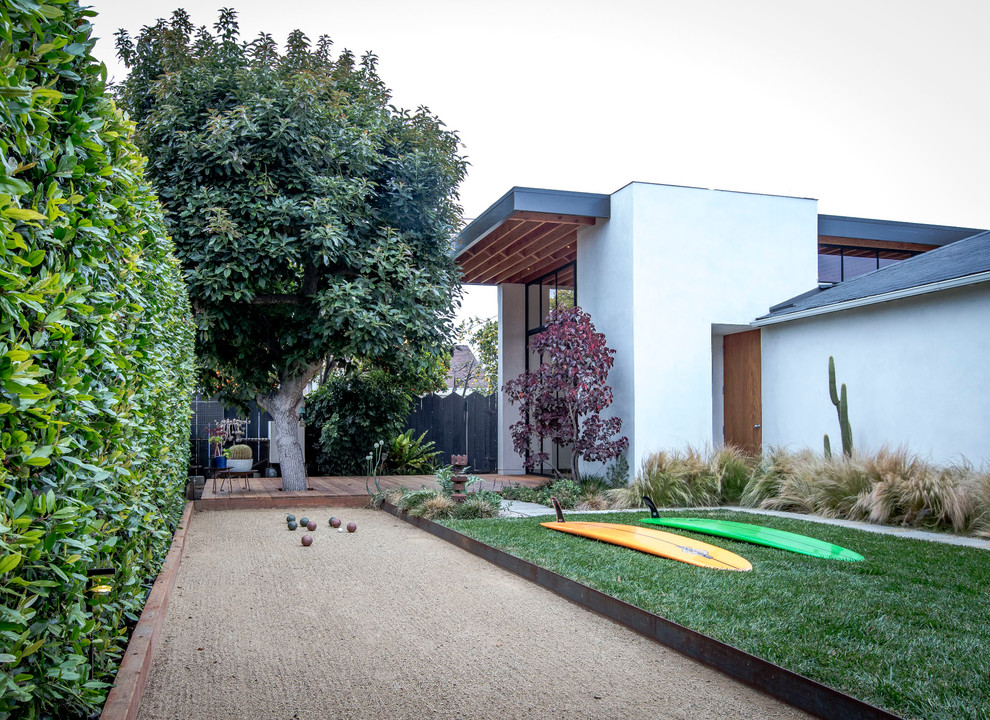 Photo of a backyard outdoor basketball/tennis/multi-game court in Los Angeles.