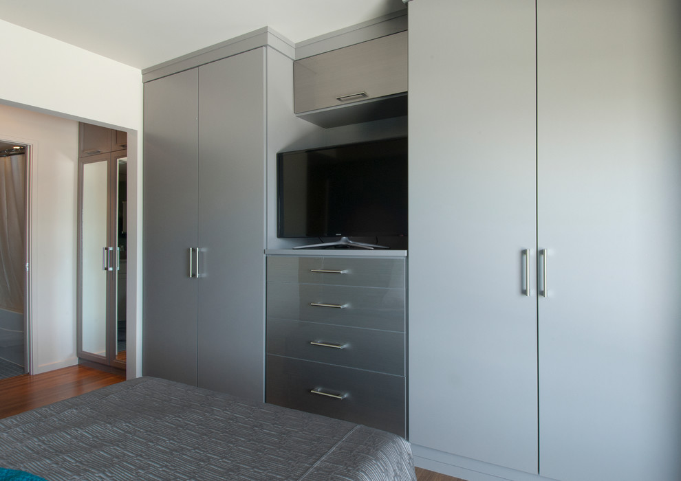 This is an example of a contemporary bedroom in Seattle.