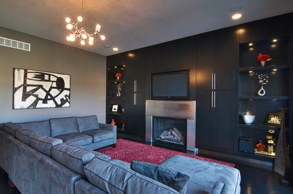 Design ideas for a contemporary family room in Chicago with grey walls.