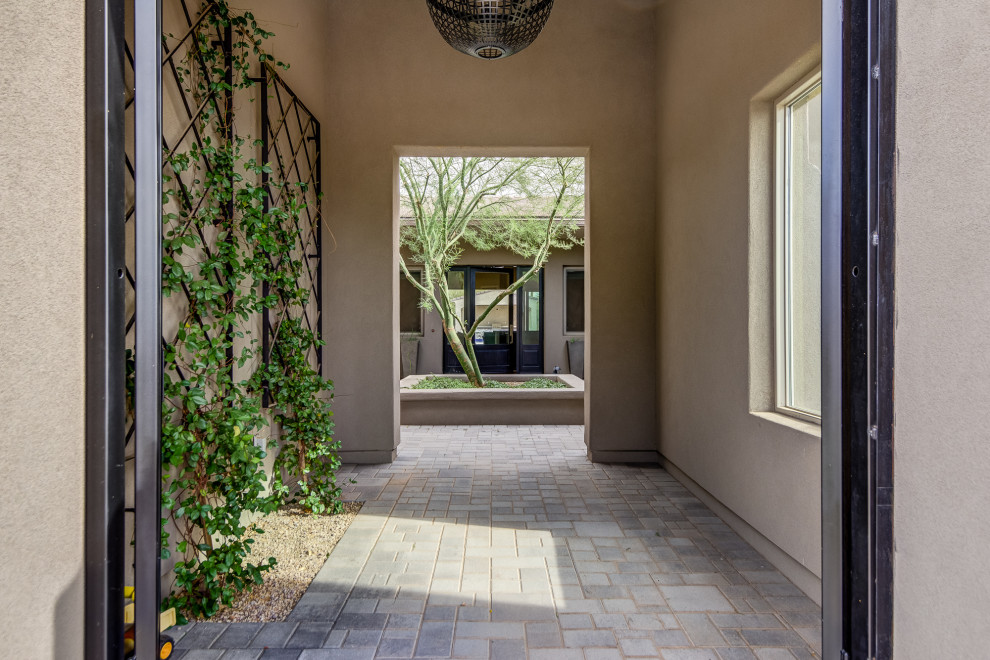 Transitional exterior home idea in Phoenix