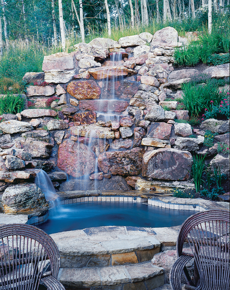 Inspiration for a small country natural pool in Denver.