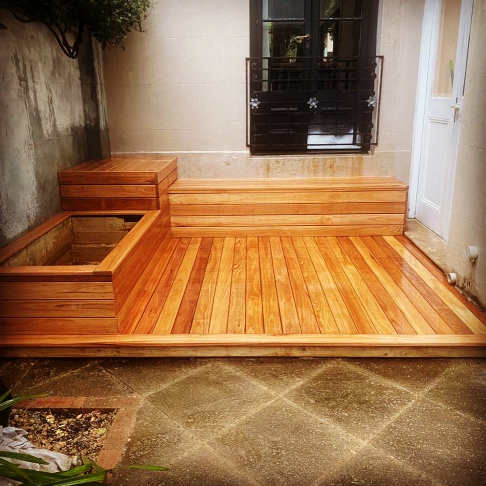 This is an example of a small contemporary deck in Sydney.