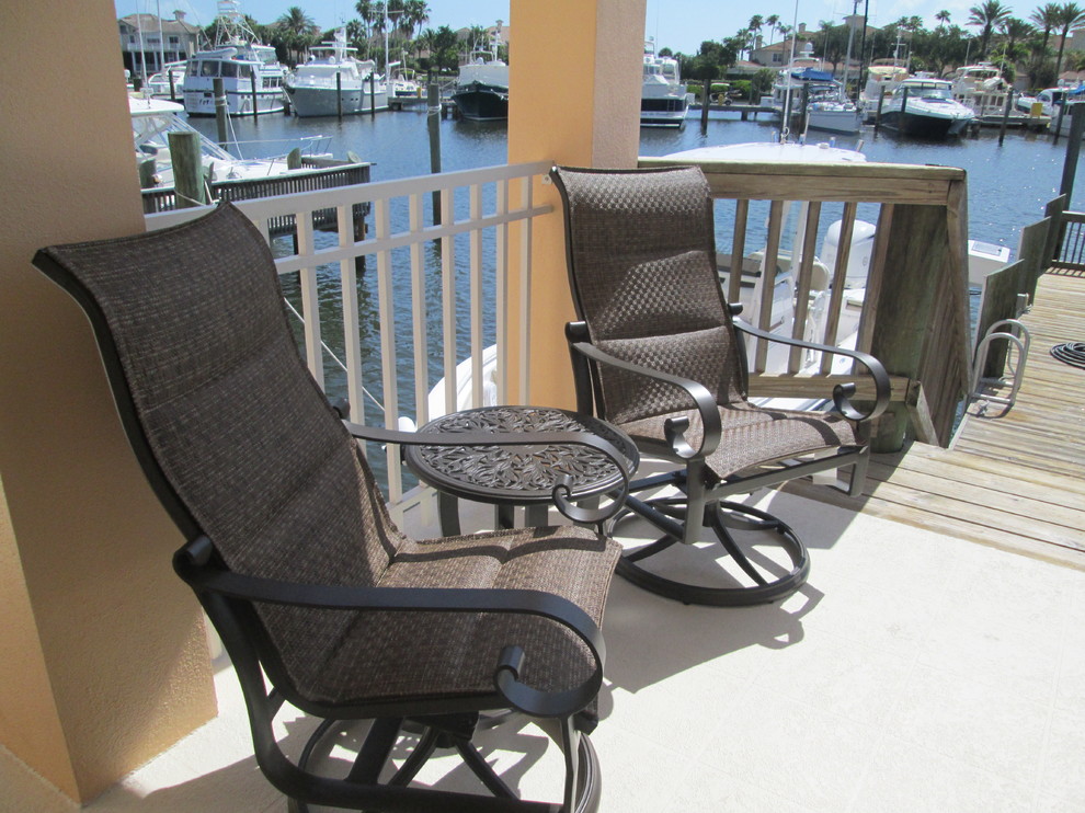 Example of a beach style home design design in Miami