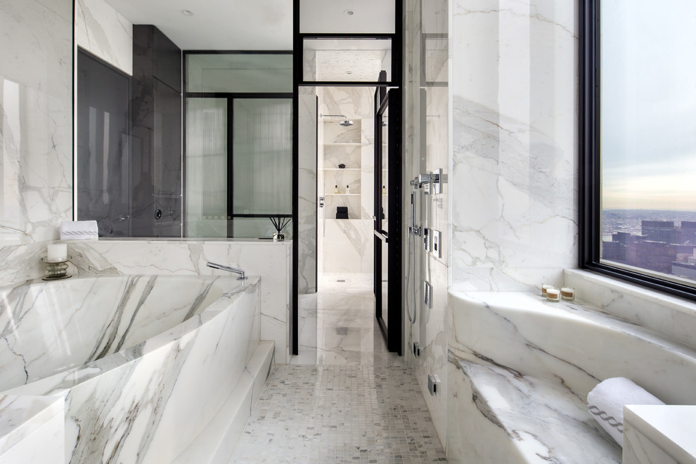 Design ideas for an expansive contemporary master bathroom in New York with flat-panel cabinets, white tile, stone tile, white walls, marble floors and marble benchtops.