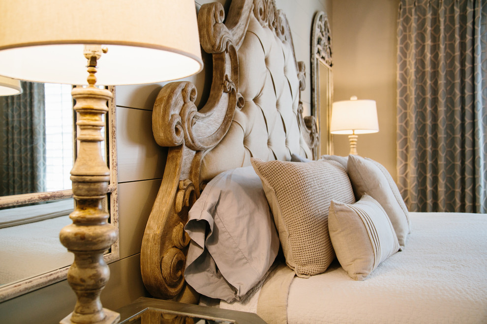 Mid-sized traditional master bedroom in Atlanta with beige walls and medium hardwood floors.