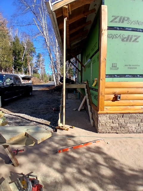 Log Siding, Stamped Concrete and Post and Beam Carport