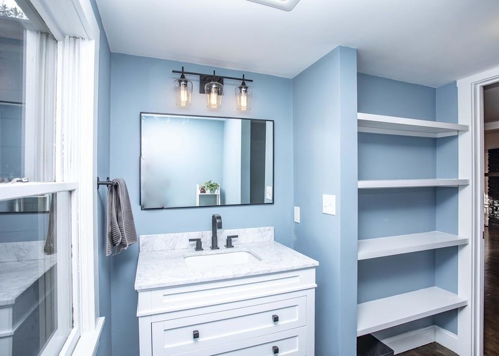 Photo of a transitional powder room in Boston.