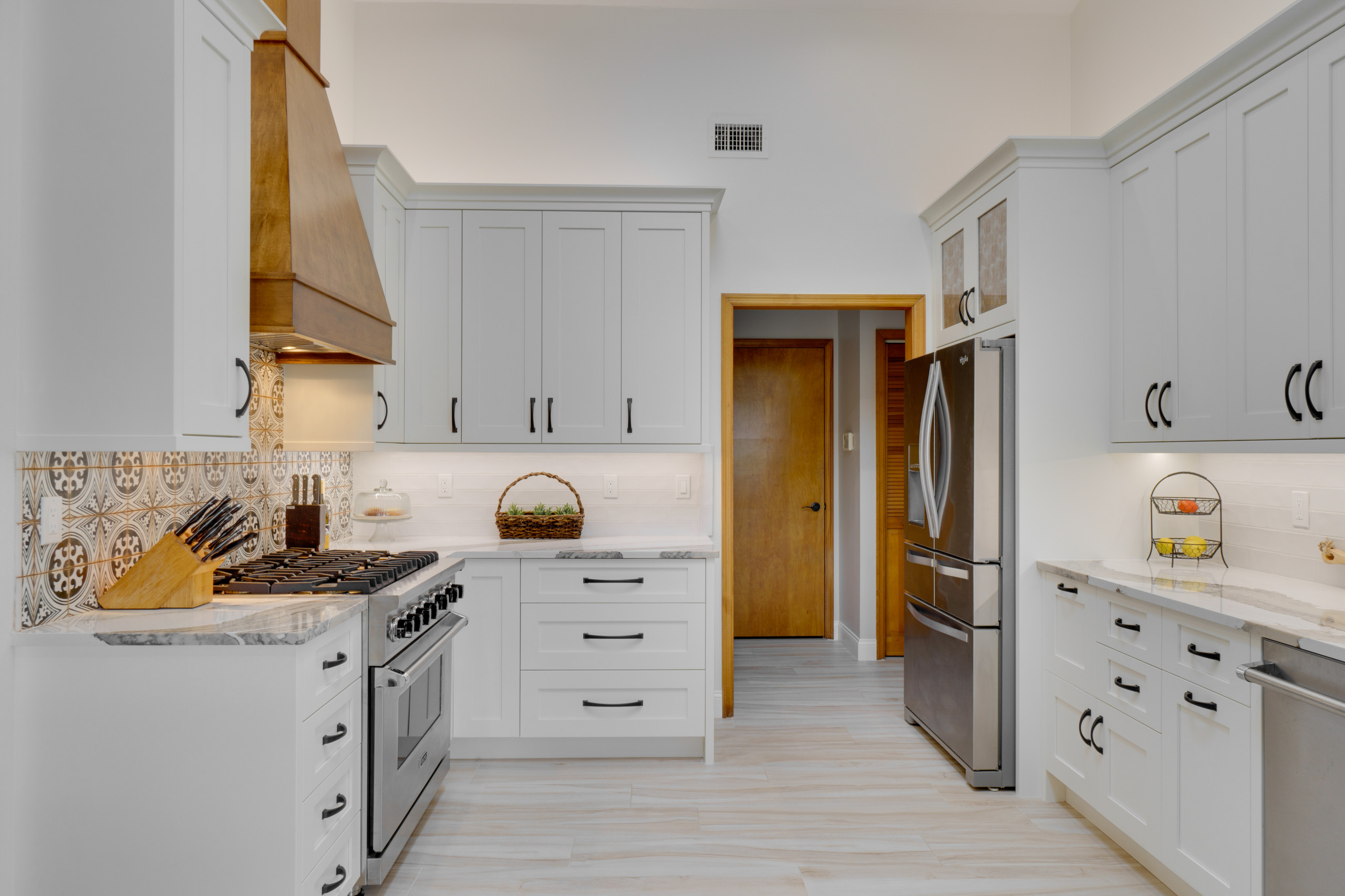 Kitchen Remodel in Painted Shaker with Stained Wood Accents