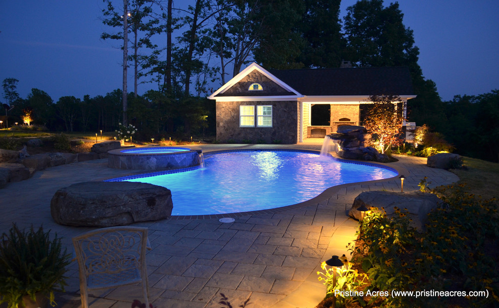 Inspiration for a huge transitional backyard concrete paver and custom-shaped natural pool fountain remodel in DC Metro