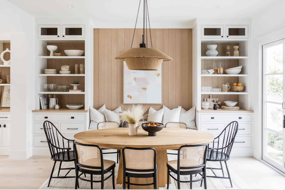 Example of a beach style dining room design in Orange County