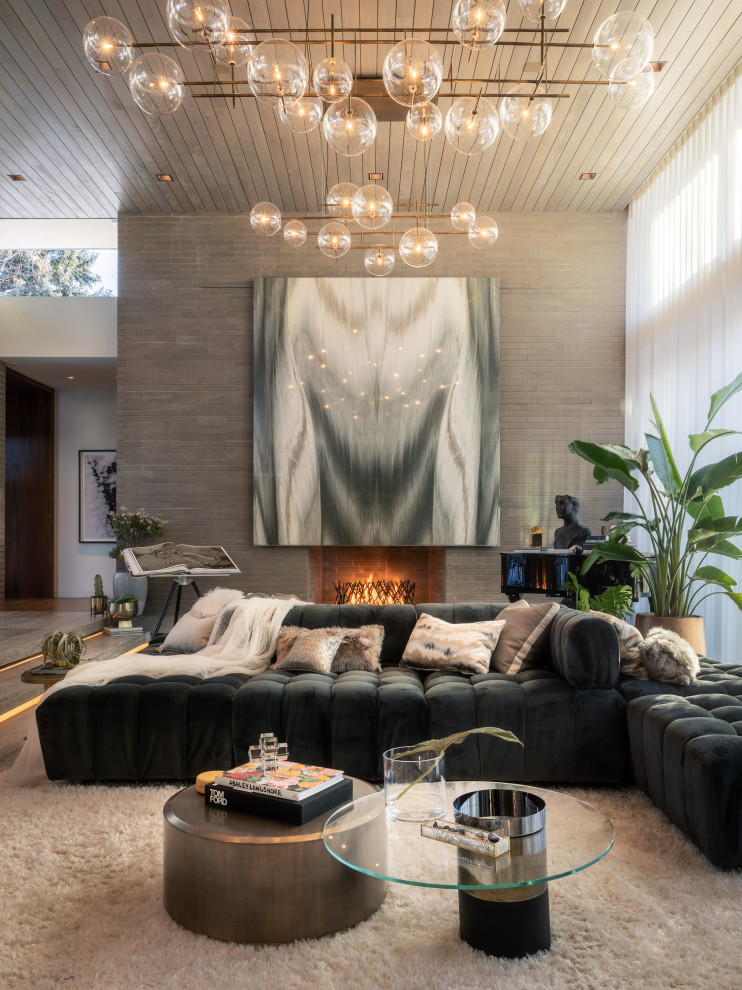 Inspiration for a large contemporary open plan living room in Denver with a music area, multi-coloured walls, travertine flooring, a standard fireplace, a brick fireplace surround, no tv, grey floors, a wood ceiling and brick walls.