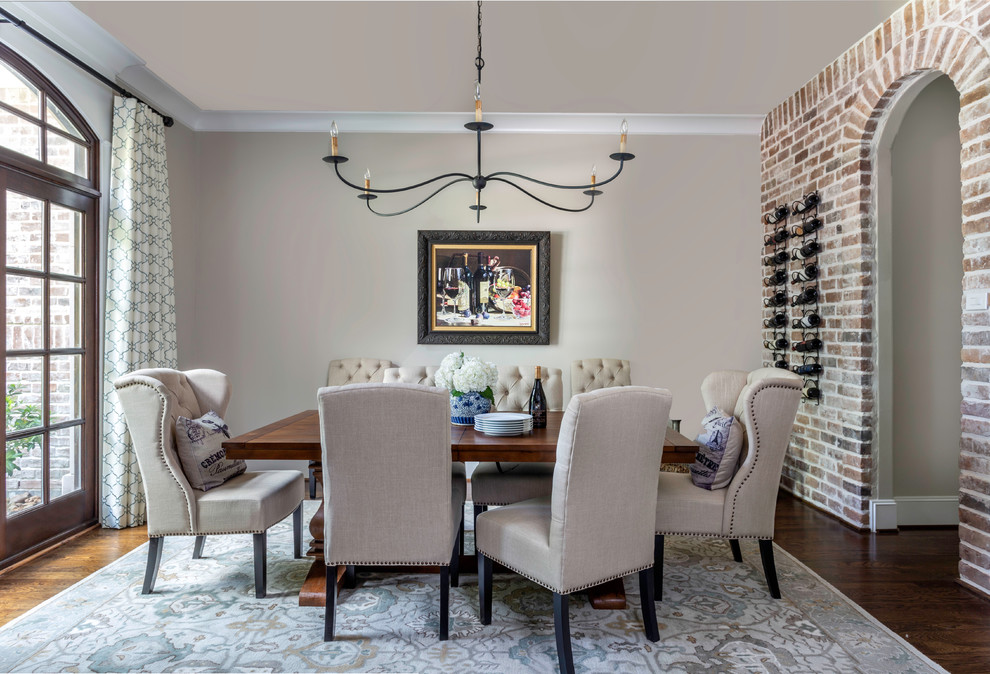 Mid-sized traditional separate dining room in Houston with beige walls, dark hardwood floors and no fireplace.