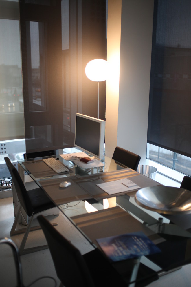 Example of a mid-sized trendy freestanding desk dining room design in New York with no fireplace