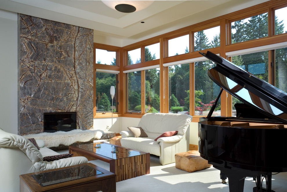 Photo of a contemporary living room in Portland with a music area.