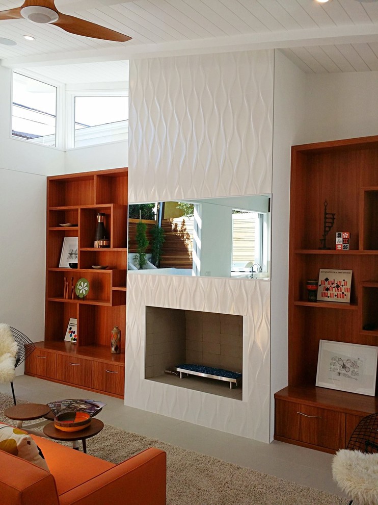 This is an example of a midcentury family room in Los Angeles.