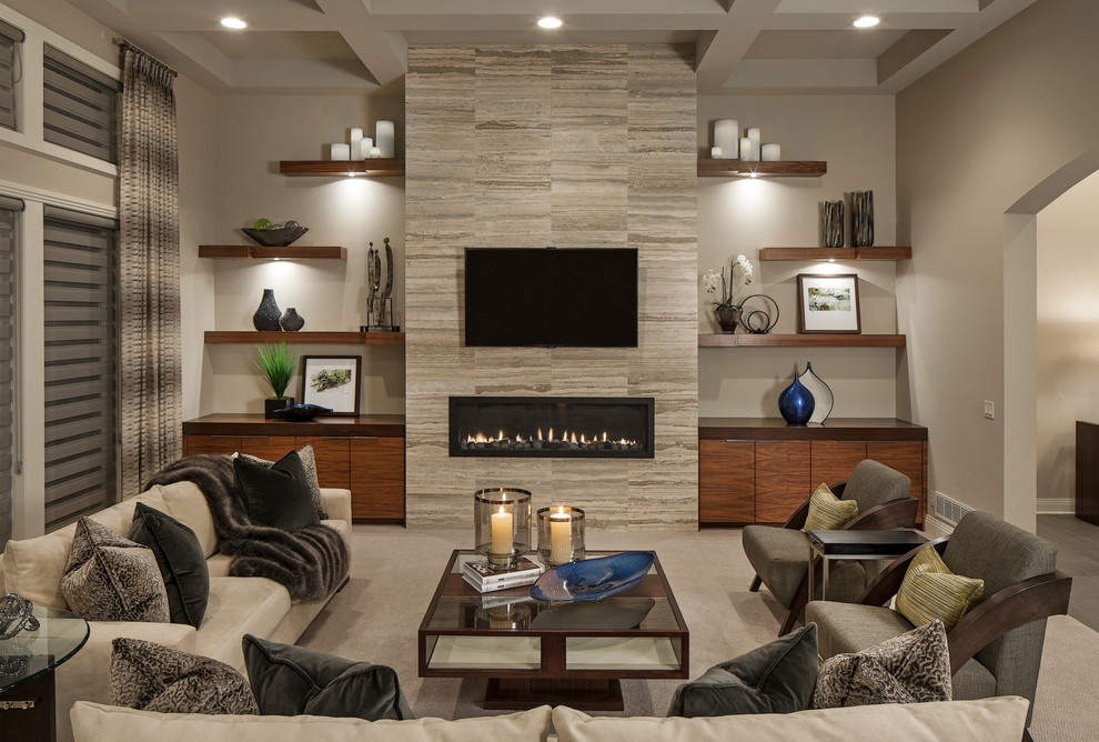 Photo of a contemporary living room in Omaha with carpet, a ribbon fireplace, a wall-mounted tv and beige walls.
