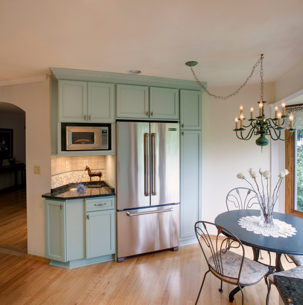 Traditional kitchen in Milwaukee with stainless steel appliances.
