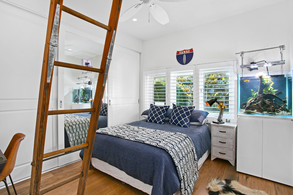 Design ideas for a mid-sized transitional guest bedroom in Sydney with white walls, dark hardwood floors and brown floor.