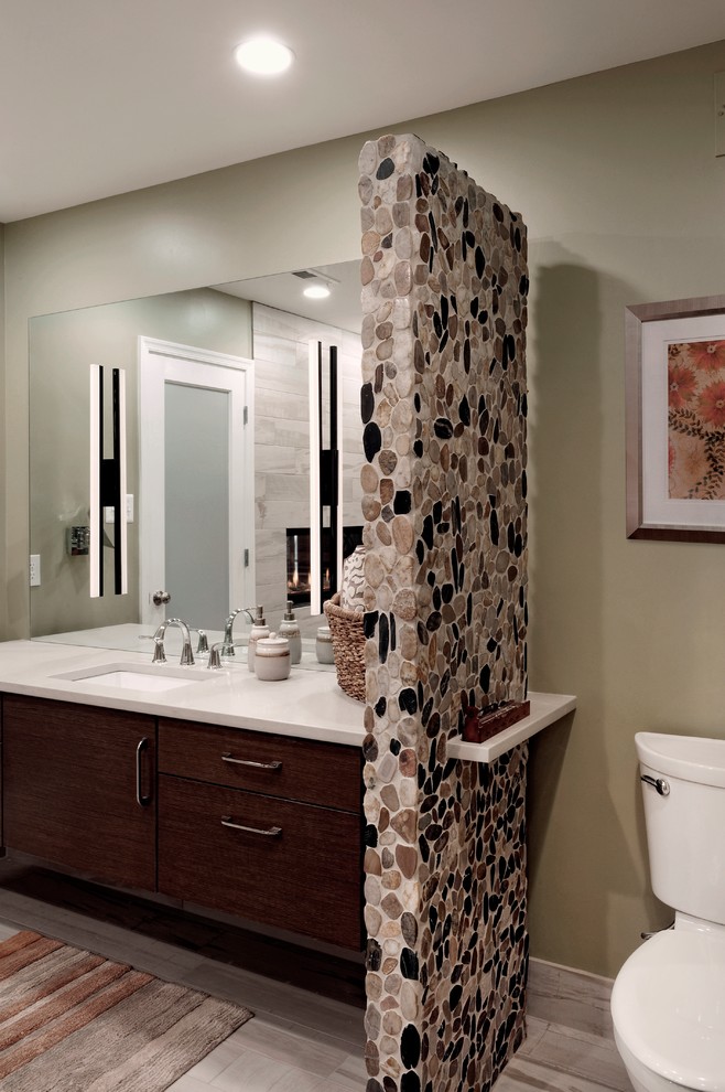Inspiration for a mid-sized transitional master bathroom in DC Metro with an undermount sink, flat-panel cabinets, dark wood cabinets, a drop-in tub, a double shower, a two-piece toilet, multi-coloured tile, porcelain tile, green walls, porcelain floors and engineered quartz benchtops.