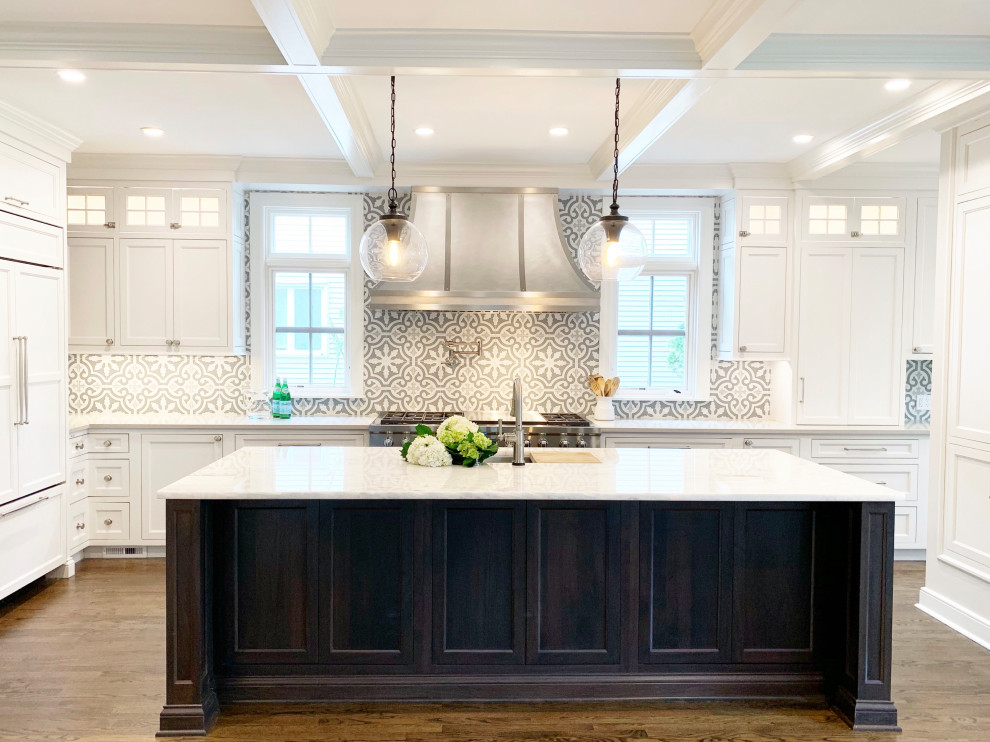 Open concept kitchen - large transitional l-shaped dark wood floor and brown floor open concept kitchen idea in Chicago with recessed-panel cabinets, white cabinets, quartz countertops, cement tile backsplash, stainless steel appliances, an island and white countertops