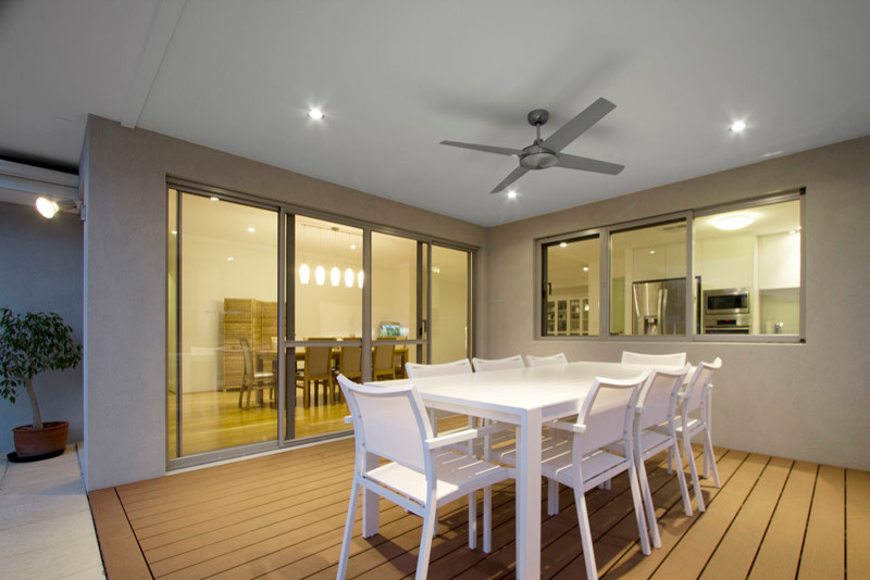 Inspiration for a transitional backyard patio in Perth with decking and a roof extension.
