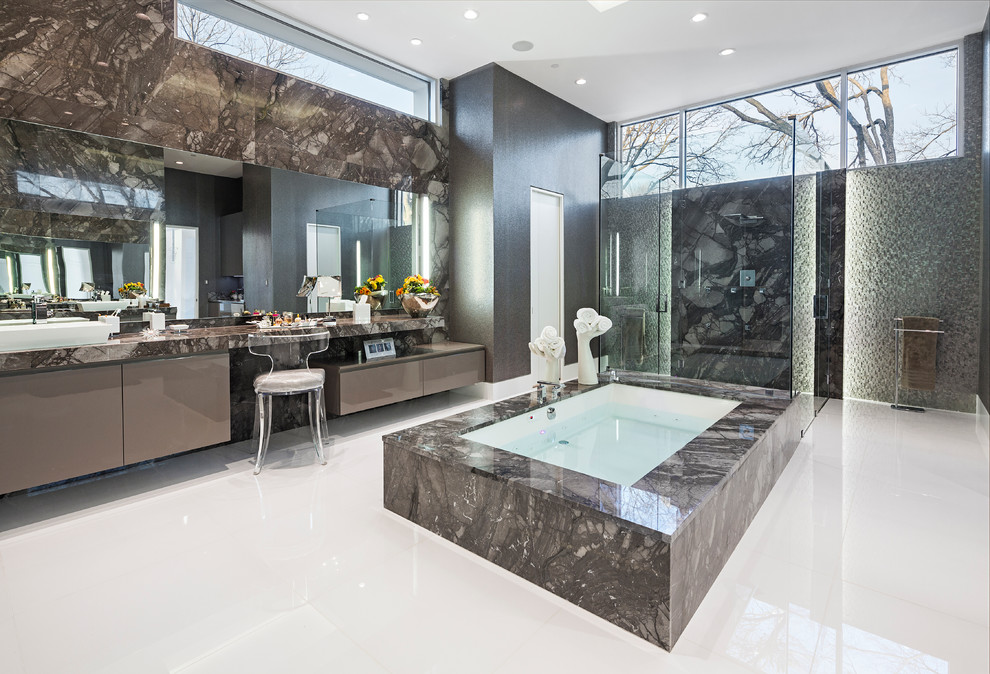 Inspiration for a large modern master bathroom in Dallas with a hot tub.