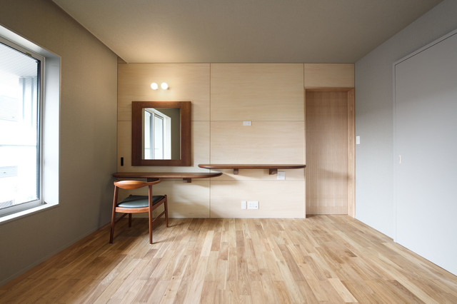 風の吹く家 skandinavisch-schlafzimmer