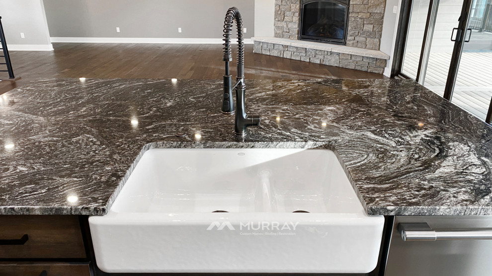 Example of a mountain style kitchen design in Omaha