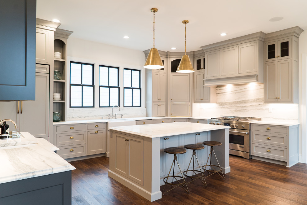 Design ideas for a large transitional kitchen in Louisville with a farmhouse sink, grey cabinets, marble benchtops, white splashback, stone slab splashback, stainless steel appliances, with island, dark hardwood floors and shaker cabinets.