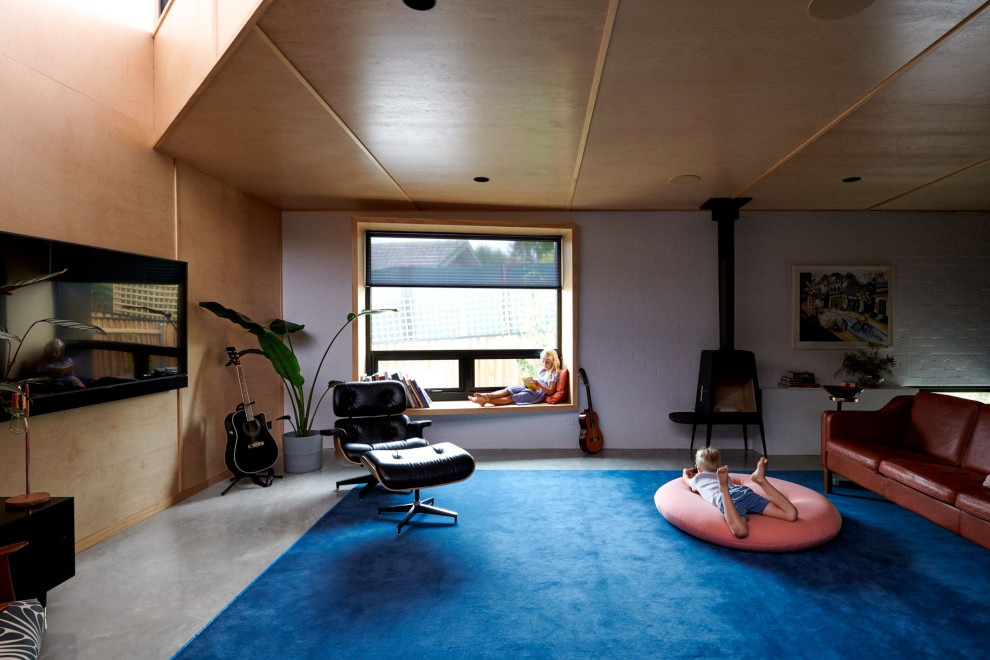 Photo of a midcentury family room in Canberra - Queanbeyan.