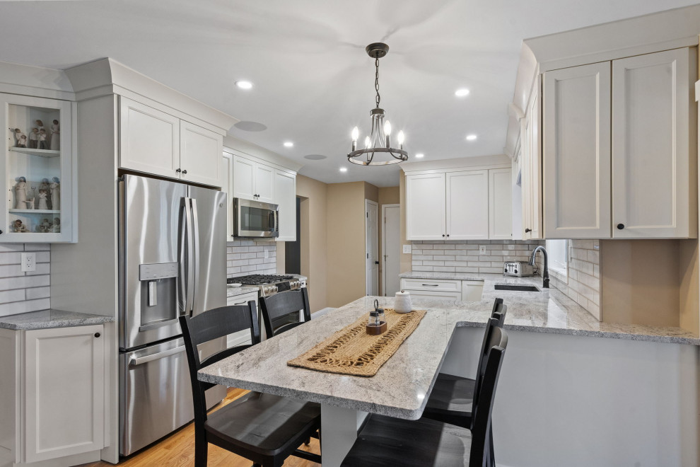 Example of a transitional kitchen design in Boston