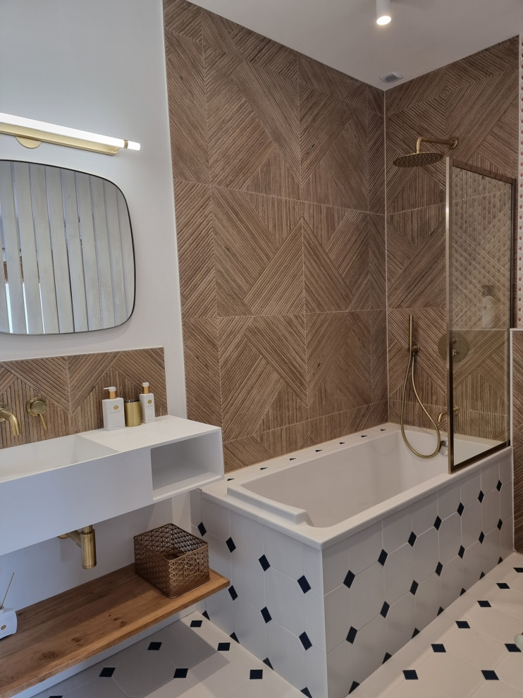 Photo of a mid-sized contemporary master bathroom in Bordeaux with open cabinets, an undermount tub, a shower/bathtub combo, beige tile, brown tile, ceramic tile, ceramic floors, a wall-mount sink, white floor, white benchtops, a single vanity, a floating vanity, wood walls and decorative wall panelling.