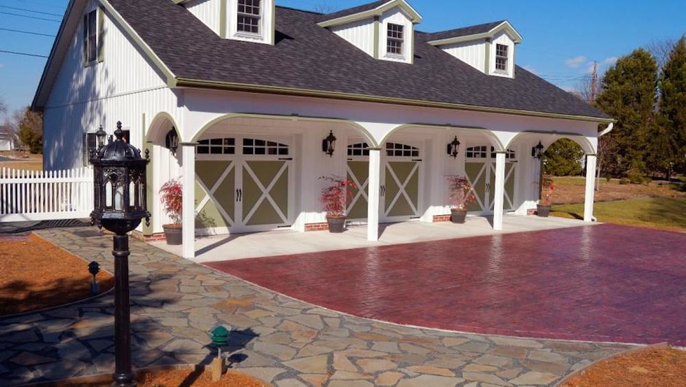Design ideas for a mid-sized transitional detached three-car porte cochere in Atlanta.