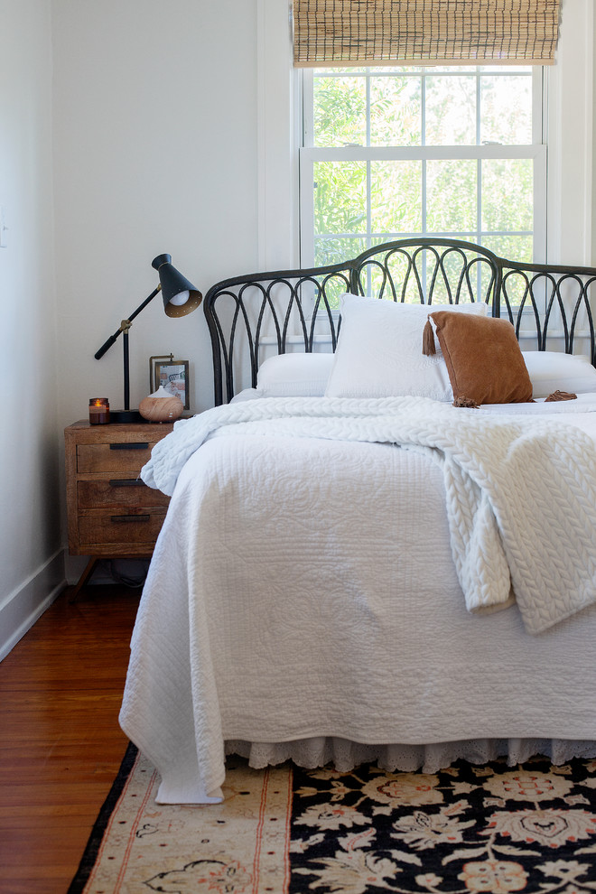 Example of a mid-century modern bedroom design in Charleston