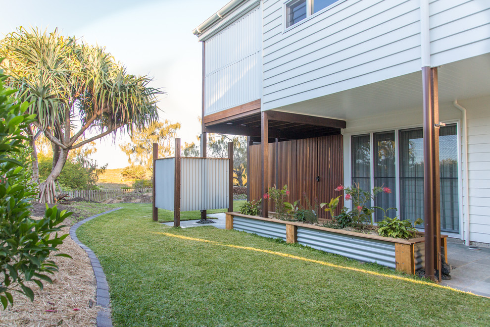 This is an example of a beach style garden in Sunshine Coast.