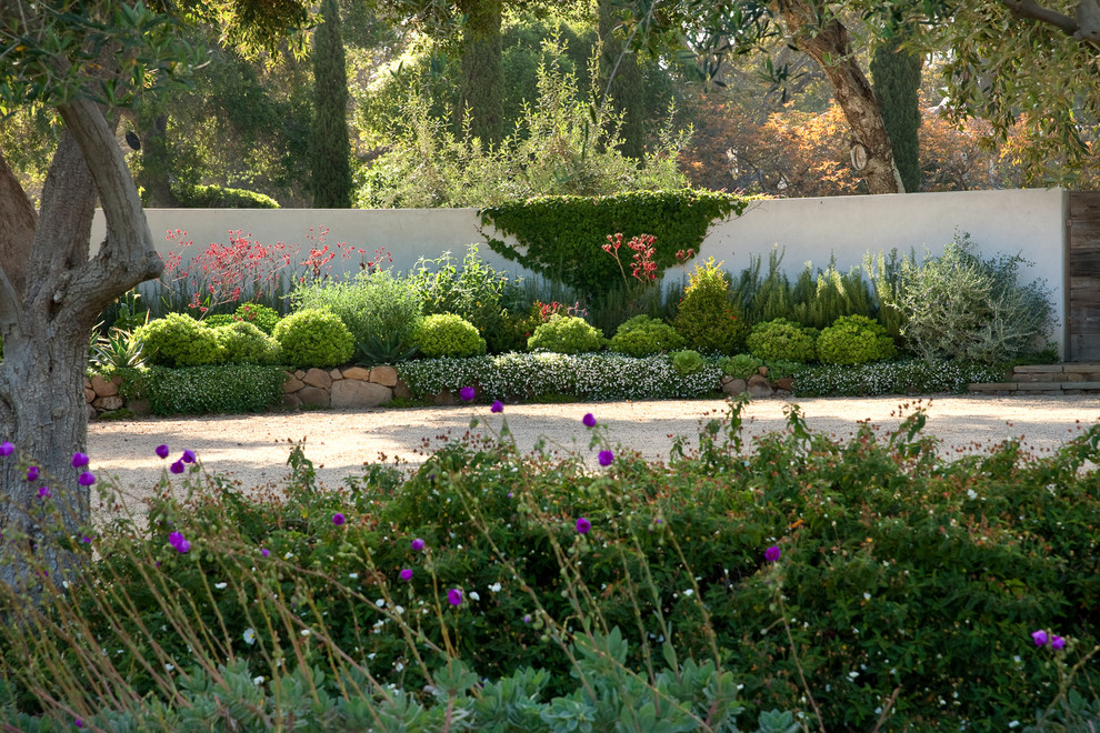 Design ideas for a mid-sized mediterranean garden in Santa Barbara.