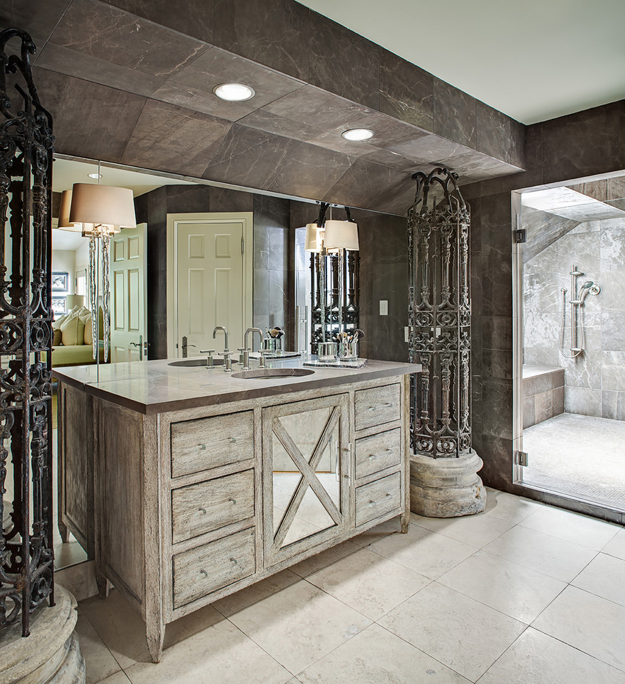 Transitional gray tile beige floor bathroom photo in Austin with distressed cabinets, an undermount sink, a hinged shower door and flat-panel cabinets
