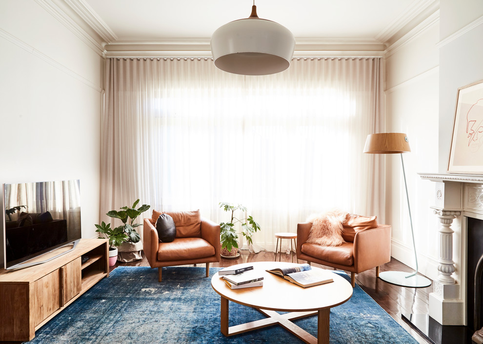 Inspiration for a mid-sized contemporary enclosed living room in Melbourne with dark hardwood floors and brown floor.