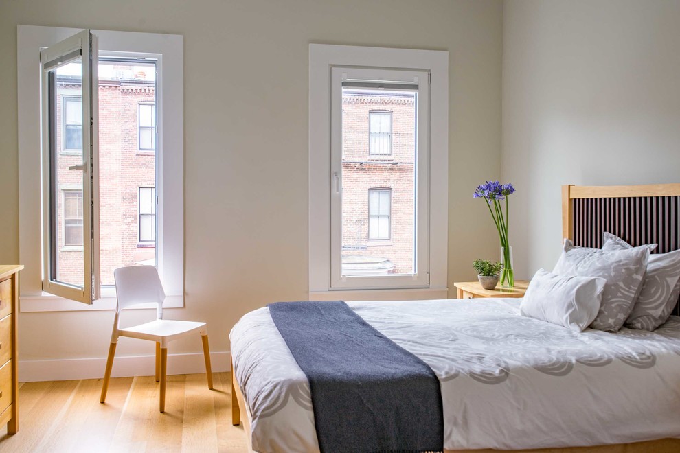 Mid-sized transitional bedroom photo in Boston with white walls