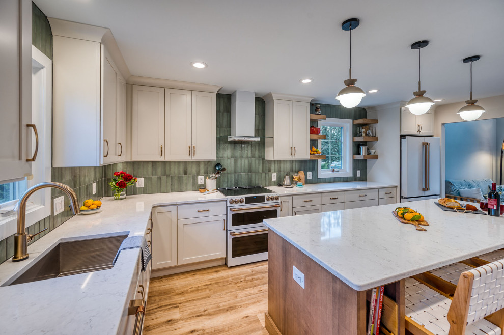 Kitchen - large transitional kitchen idea in DC Metro with flat-panel cabinets, white cabinets, quartz countertops, green backsplash, ceramic backsplash, an island and white countertops