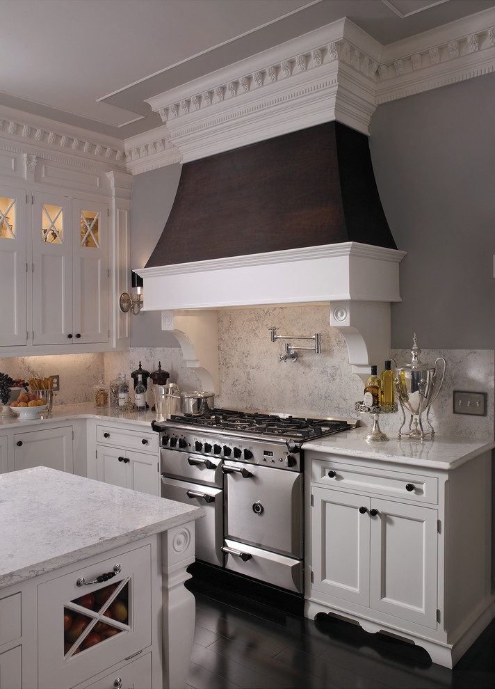 Photo of a traditional kitchen in Other with white cabinets.