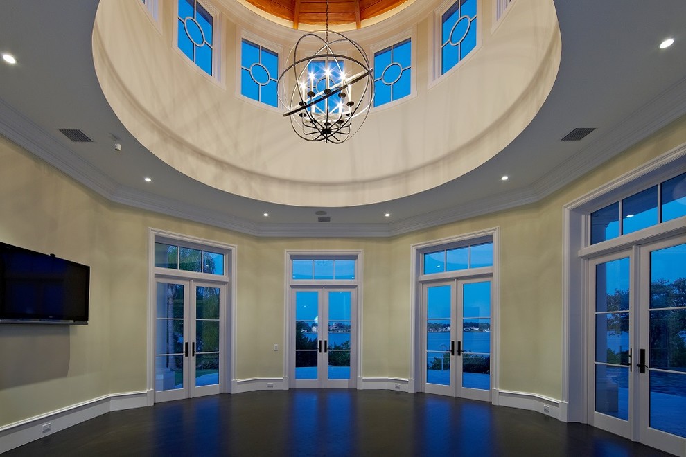 This is an example of a beach style family room in Tampa.