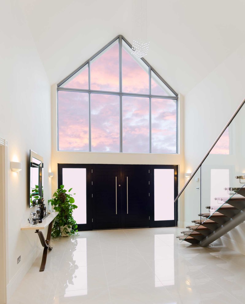 This is an example of a contemporary entryway in Buckinghamshire.