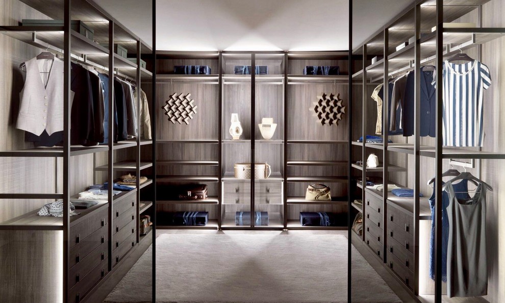 Design ideas for a large contemporary gender-neutral walk-in wardrobe in Miami with open cabinets, dark wood cabinets, medium hardwood floors and brown floor.