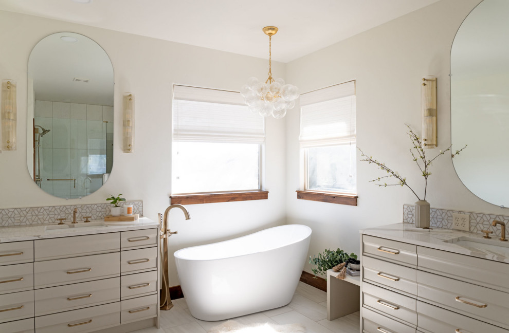Example of a transitional home design design in Denver