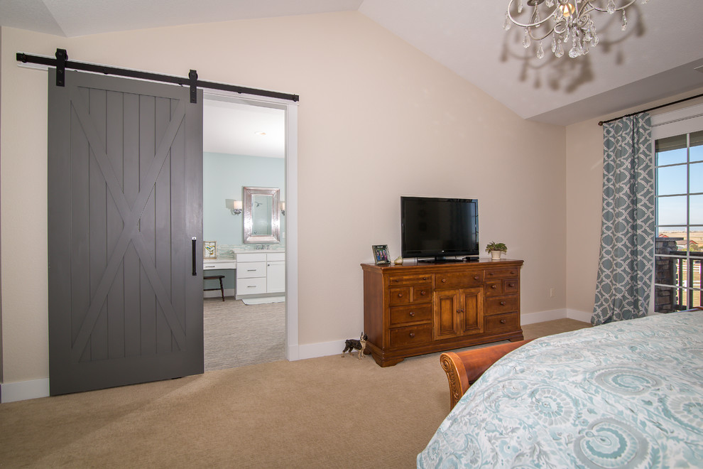 This is an example of a mid-sized arts and crafts master bedroom in Denver with grey walls, carpet, no fireplace and beige floor.